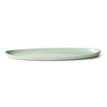 Handmade Oval Shaped Fish Platter in porcelain, designed for serving fish, snacks, or dips. Features a smooth, stone-like exterior and clear glazed interior.