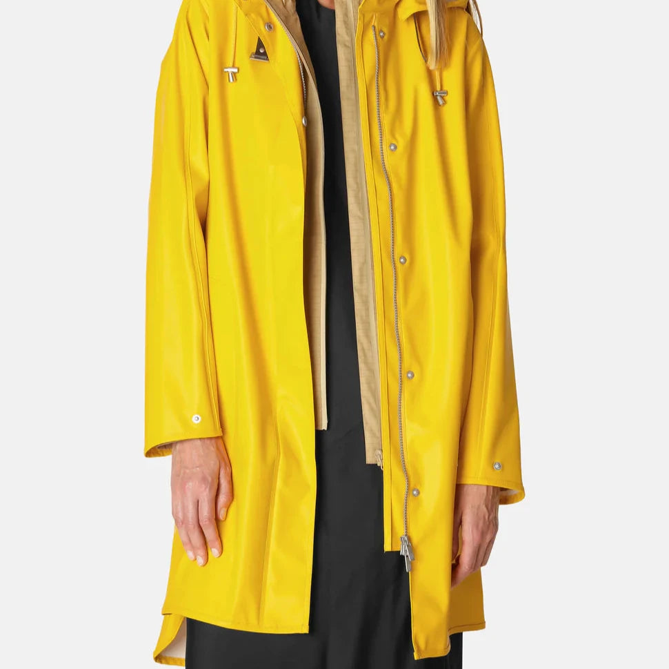 Ilse Jacobsen Light True Rain Raincoat Rain71 in A-line shape with detachable hood, adjustable cuffs, and side seam pockets, waterproof PU fabric, available in size 38/Small/8/10