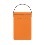 FIELDBAR Drinks Box hardcase cooler with leather handle and brass-coated hardware, showcasing its sleek design and Pantone 2025 color, placed on an outdoor surface. Drinks Box /Orchard Orange