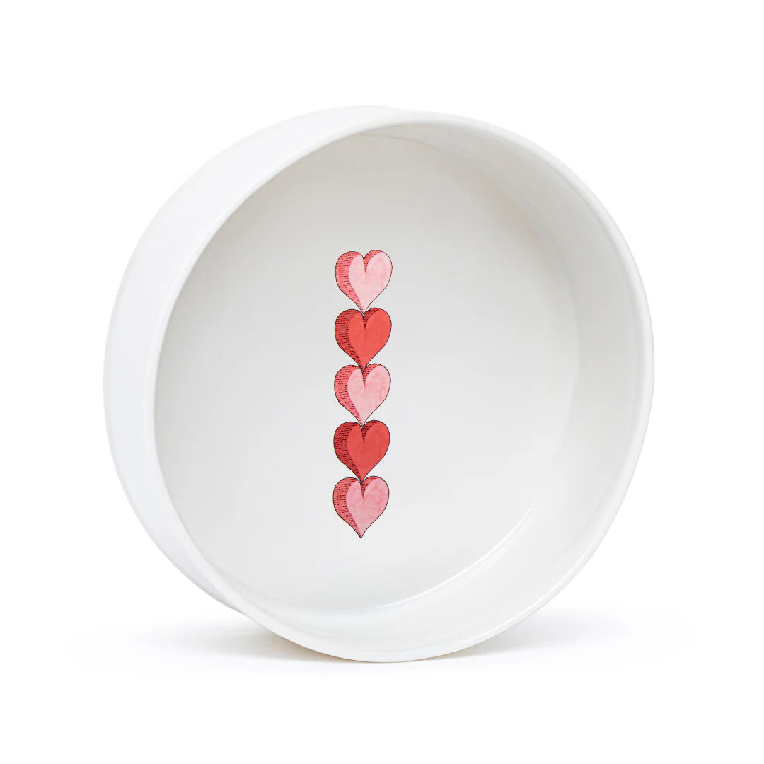 "Top view of the Five Hearts Ramekin showcasing the hand-applied heart-shaped illustrations and the ramekin’s delicate craftsmanship."