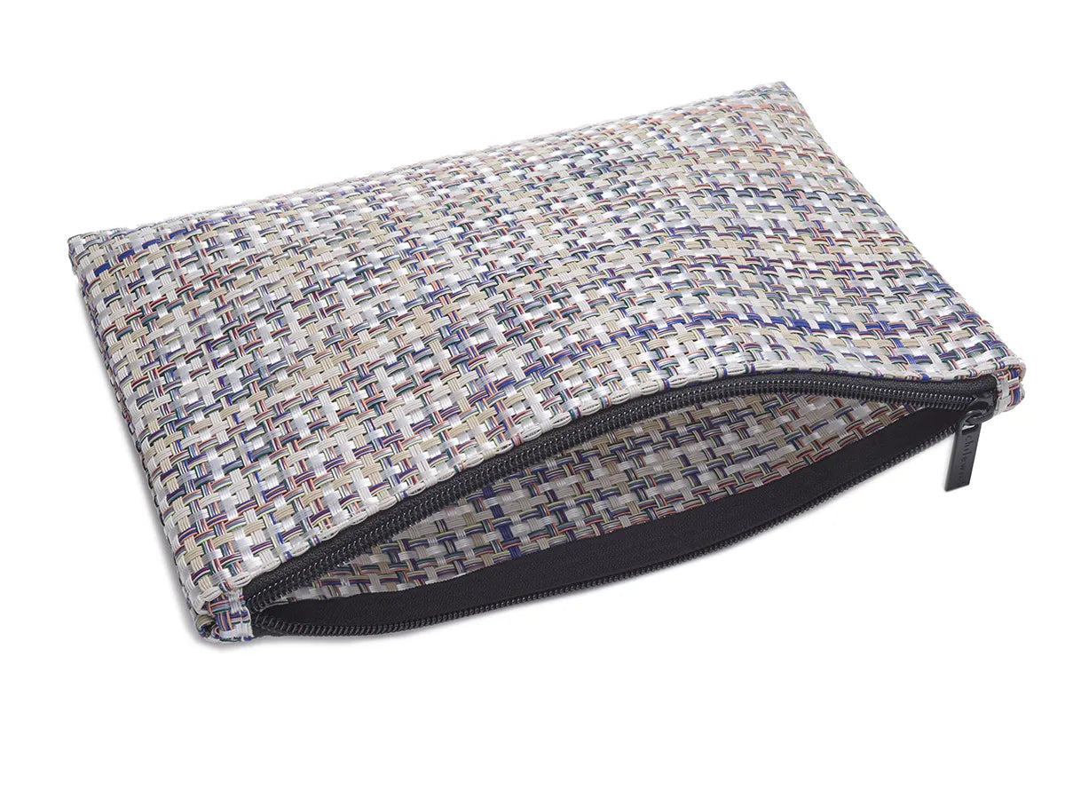 "Chilewich special edition zippered pouches in Basketweave and Mini Basketweave patterns, durable, sleek, perfect for cosmetics, cords, chargers, and digital devices.