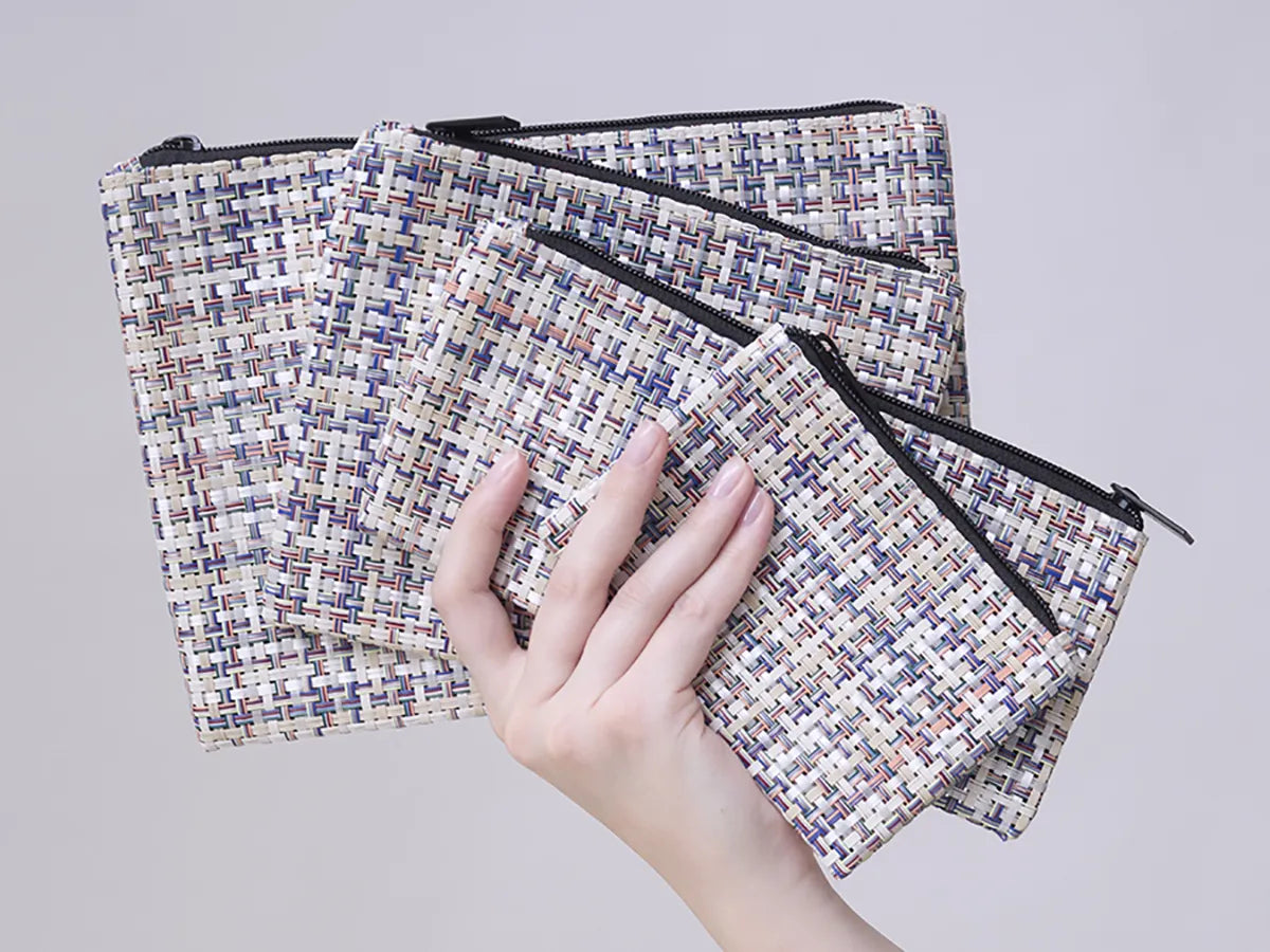 "Chilewich special edition zippered pouches in Basketweave and Mini Basketweave patterns, durable, sleek, perfect for cosmetics, cords, chargers, and digital devices.