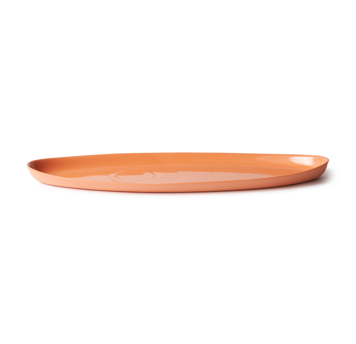 Handmade Oval Shaped Fish Platter in porcelain, designed for serving fish, snacks, or dips. Features a smooth, stone-like exterior and clear glazed interior.