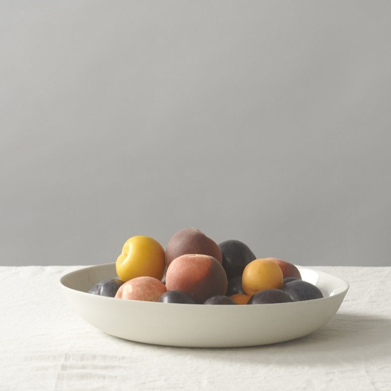 Handmade Pebble Bowl Large in porcelain, perfect for serving or display. Features a smooth stone-like exterior and clear glazed interior.