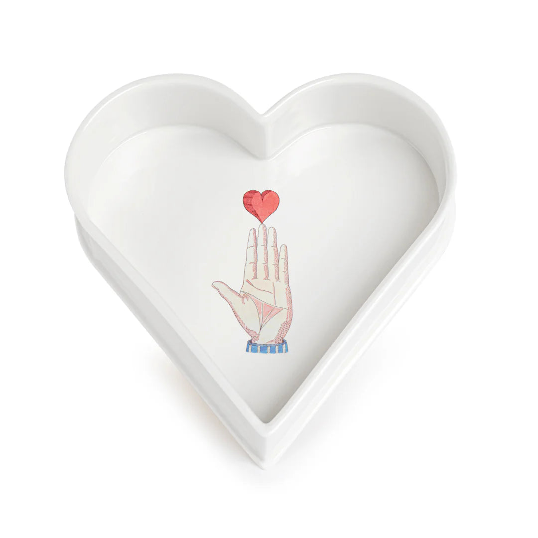 "Handcrafted enameled porcelain heart dish with watercolor illustration by Marin Montagut, perfect for decorative use or small treats."