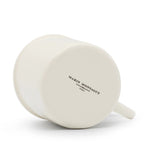 Bottom view of the Crowned Heart Mug by Marin Montagut, emphasizing its shape and fine porcelain material.