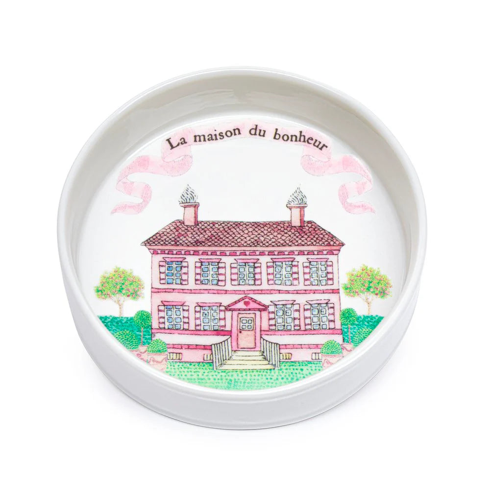 "Front view of the House of Happiness Ramekin, featuring charming illustrations and an enameled porcelain finish, handmade in Paris, France."