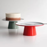 Falcon Enamel Cake Stand with heavyweight steel construction and thick enamel coating, perfect for displaying cakes and desserts.